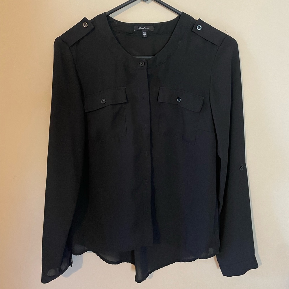 Sheer black blouse.